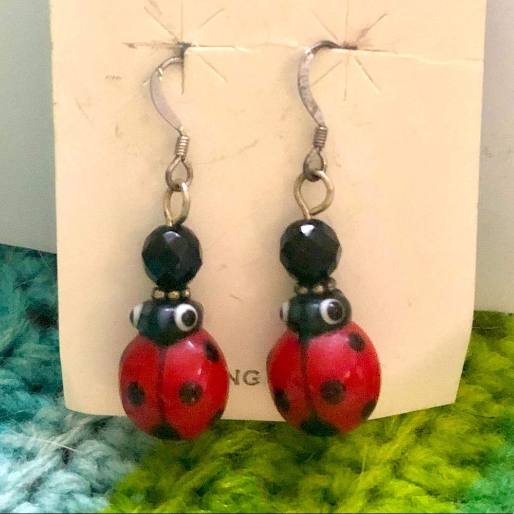 Lamp work glass & silver dangling ladybug earrings
